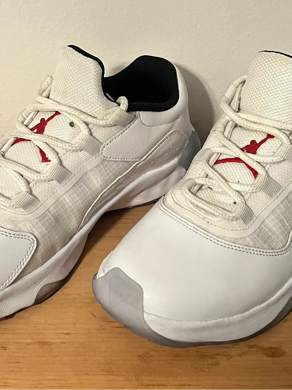 Jordan Kids White Sneakers with Red Jumpman Accent